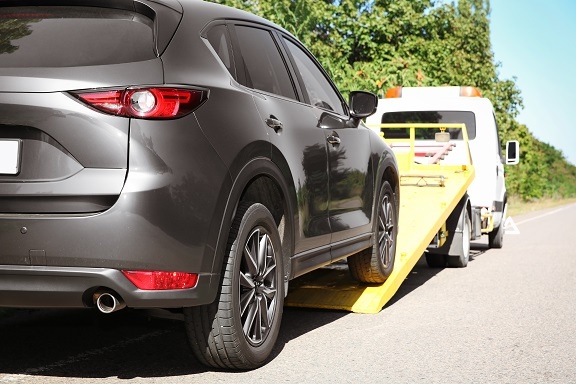 Recovery of a road vehicle from the road